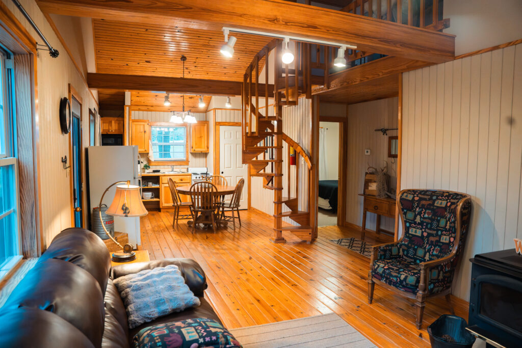 Cozy interior of a Peaceful Pointe cabin with modern amenities in Solgohachia, Arkansas.