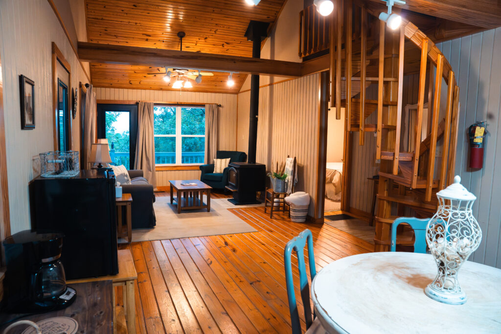 Cozy interior of a Peaceful Pointe cabin with modern amenities in Solgohachia, Arkansas.